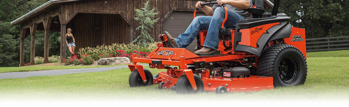 Man on Bad Boy Riding Lawn Mower