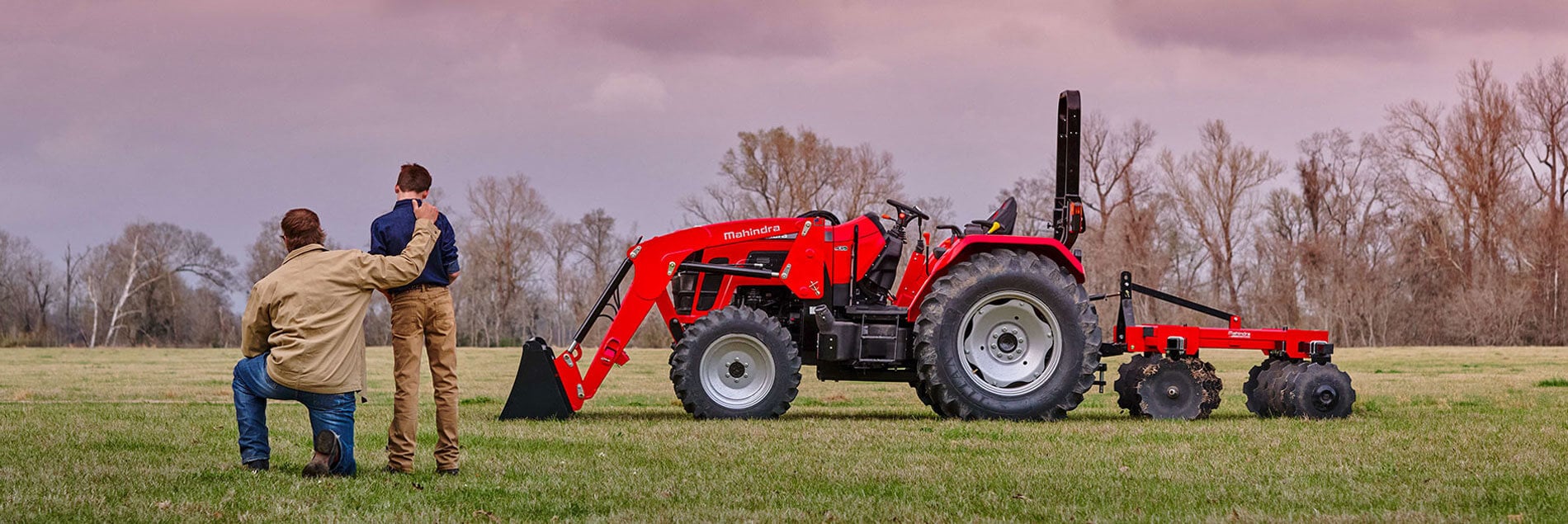 Mahindra Loader with Grader Attached